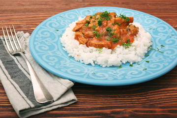 Rice with meat in tomato sause