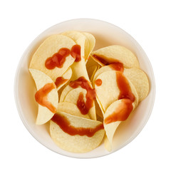 potato snacks with ketchup in a white bowl isolated on white