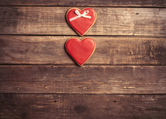 heart shaped cookies lying on the wonderful brown wooden background