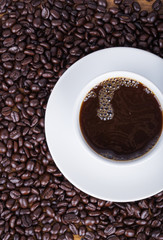 hot Coffee cup and beans