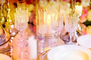 Beautiful table setting with crockery and flowers for a party, wedding reception or other festive event