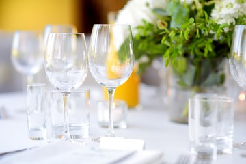 Beautiful table setting with crockery and flowers for a party, wedding reception or other festive event