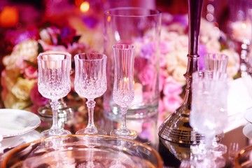 Beautiful table setting with crockery and flowers for a party, wedding reception or other festive event