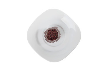 Traditional candy from Brazil called brigadeiro over white background