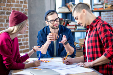 Designers working at project