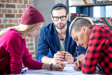 Designers working at project