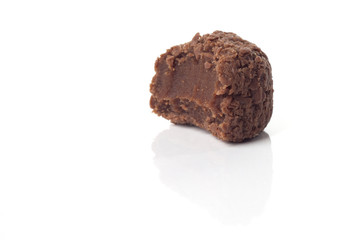Traditional candy from Brazil called brigadeiro over white background