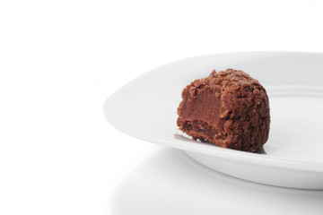 Traditional candy from Brazil called brigadeiro over white background