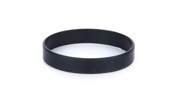 Blank rubber plastic stretch black bracelet isolated on white background.