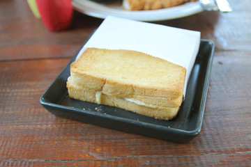 cheese bread on wooden table in the shop