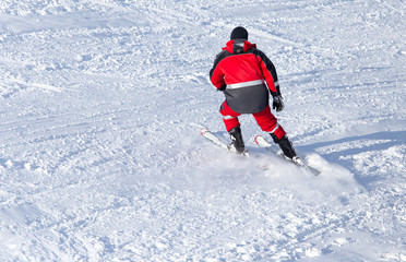 Fototapeta na wymiar man skiing in winter