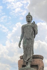 Big Buddha statue ancient on blue sky background  in Nakhon Pathom Province of Thailand