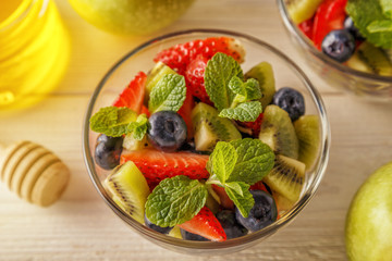 Healthy homemade fruit salad with honey.