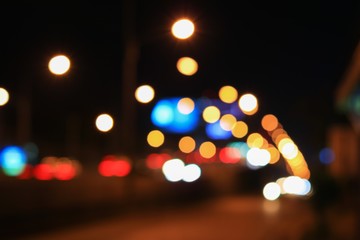 Abstract blurred bokeh in city night  colorful beautiful of traffic in Bangkok Thailand, with copy space