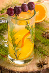 orange lemonade with cherry and rosemary