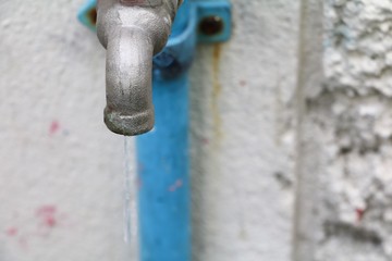 faucet with water drop :Select focus with shallow depth of field. and copy space for add text