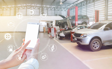 Smartphone and car service icon concept, Woman hand using smartphone