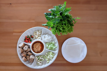 vietnamese food on wood background.