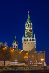 Fototapeta na wymiar Spasskaya tower facing the Red square is one of the 20 towers of the Moscow Kremlin. In the tower are the main gates of the Kremlin — Spassky, in a marquee tower installed the famous clock — chimes.