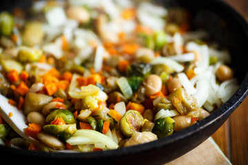 Brussels sprouts roasted with vegetables and beans