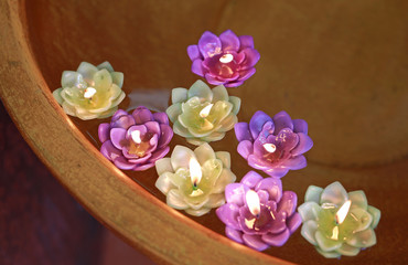 Lotus candle on the water, Thailand