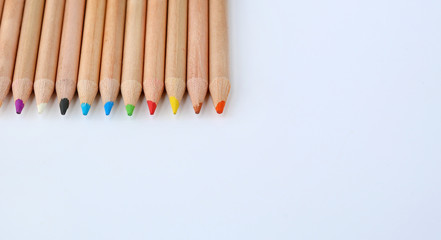 Fototapeta premium colored pencils on white background