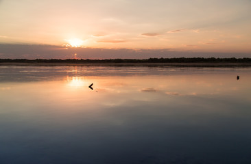 sunset on the lake as a backdrop