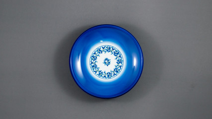 Blue food bowl small, Japanese-style floral pattern.gray background and empty