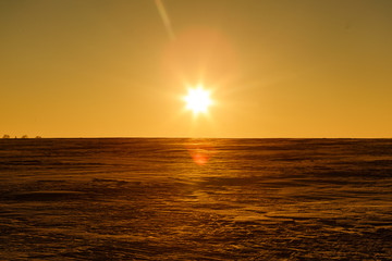 Martian sunset (Mars planet) red landscape. Looks like cold desert on Mars. A huge field of ice