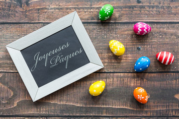 Easter eggs and frame with greetings © Photographee.eu