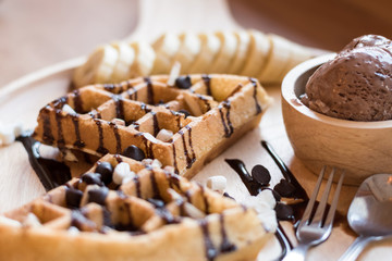 delicious sweet dessert : homemade waffle with chocolate sauce ,selective focus