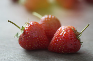 Fresh strawberries on wooden table