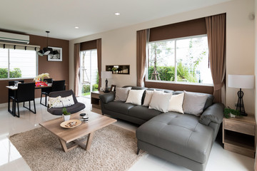 Beautiful room interior with hardwood floors and view of new luxury home