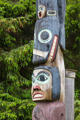 Totem Pole and Fir Trees