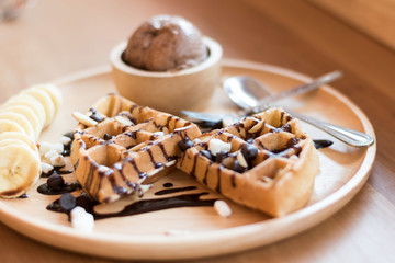 delicious sweet dessert : homemade waffle with chocolate sauce ,selective focus.