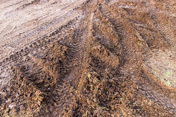 track from a car in a dirty ground
