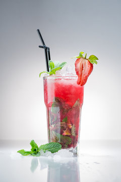strawberry Mojito cocktail with lime and mint