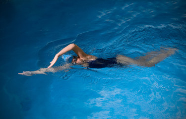 Young woman swimmer