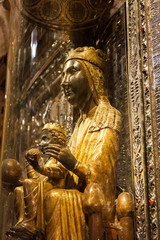 The wooden statue of the Black Madonna with Child in her arms in the Montserrat monastery, Catalonia, Spain