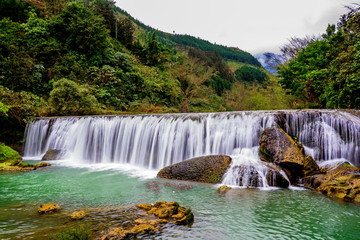Fototapeta premium The Jiulong (nine dragon )waterfall yunnan, china.