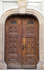 Old vintage wooden brown door close-up