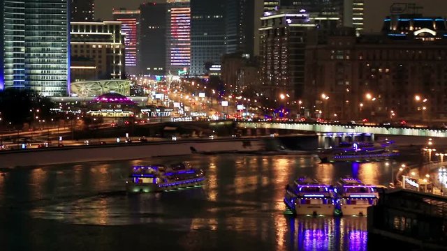 evening the streets of Moscow in the winter. View of the Novy Arbat street and the river Moscow