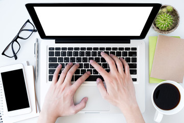 Fototapeta premium Man is typing on laptop keyboard. Top view with copy space, flat lay.