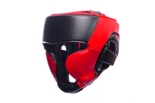 An image of a red boxing helmet on a white background