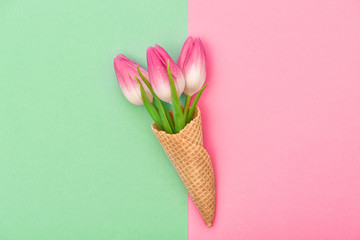 Tulip flowers ice cream waffle cone flat lay Spring