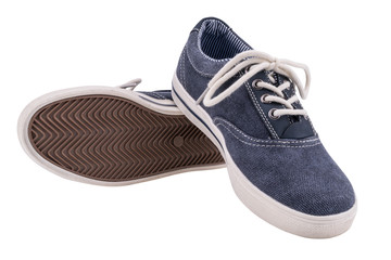 Picture of a pair of blue trainers over a white background.