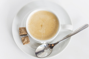 white cup of coffee on a white background