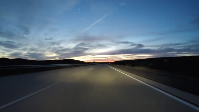 Mojave desert dusk driving time lapse on Interstate 40 in Southern California.  