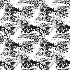 Abstract seamless pattern witn black dots on white background