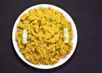 Upma, uppumavu or uppittu is a common South Indian breakfast dish, cooked as a thick porridge from dry roasted semolina or coarse rice flour.